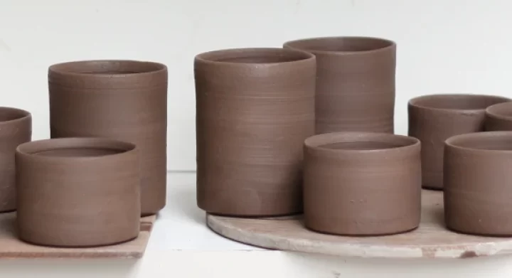 Row of cylindrical wheel thrown pots