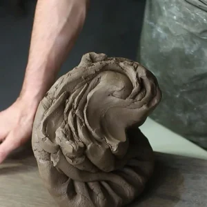 Spiral wedged and kneaded clay